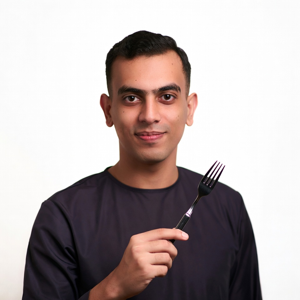 Man holding black fork Man holding black fork