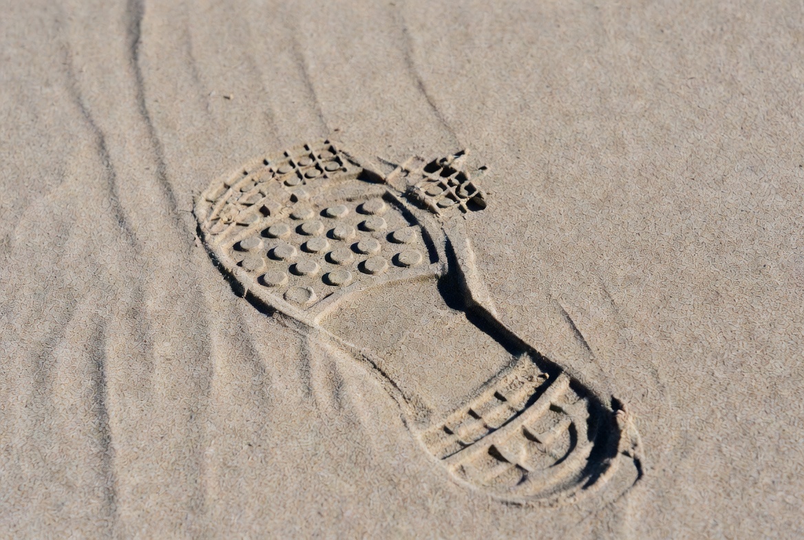 Sneaker Footprint in Sand Sneaker Footprint in Sand
