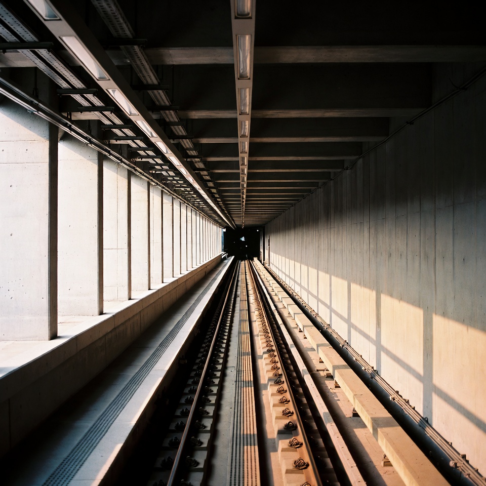 Empty Train Tracks in Tunnel Empty Train Tracks in Tunnel