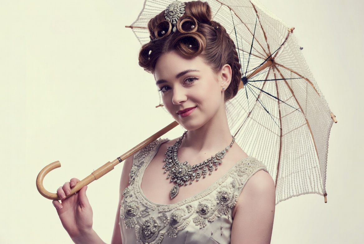 Woman holding vintage parasol Woman holding vintage parasol
