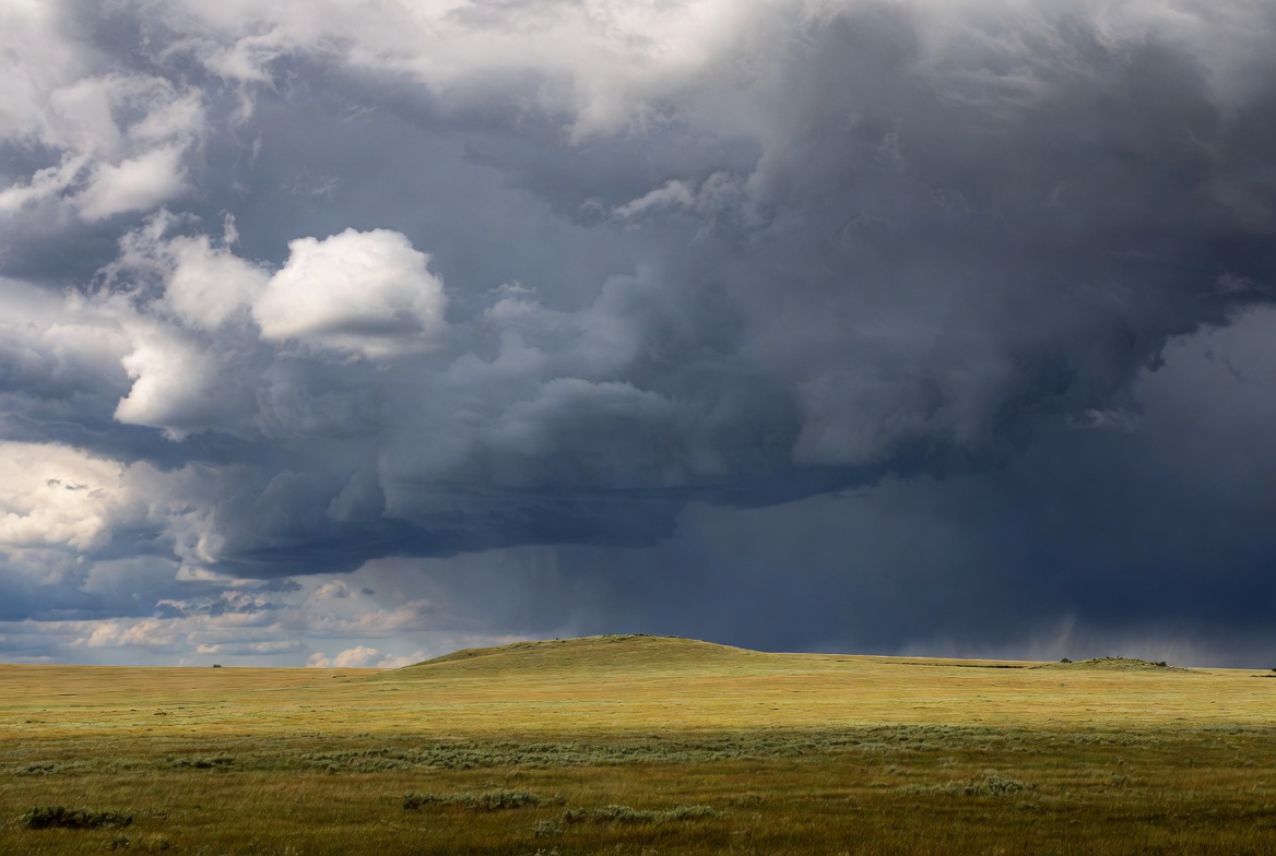 Dark Storm Clouds Over Grassland Dark Storm Clouds Over Grassland