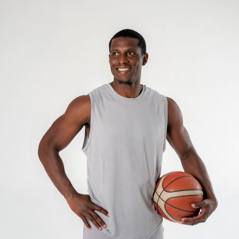 African-American man holding basketball African-American man holding basketball