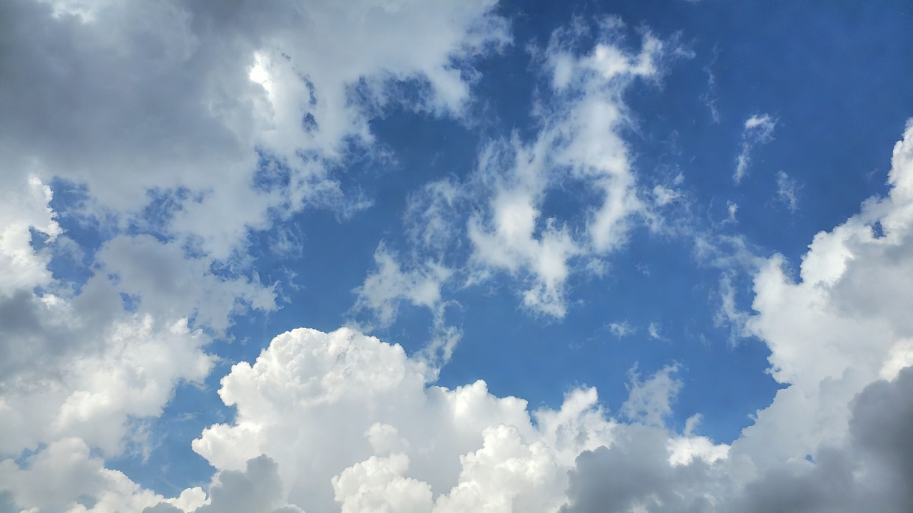 Fluffy Clouds in Blue Sky Fluffy Clouds in Blue Sky