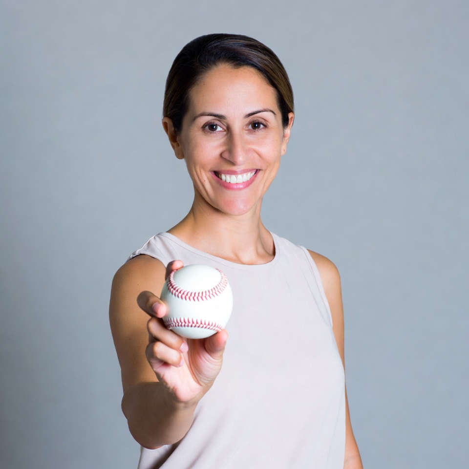 Woman holding baseball Woman holding baseball