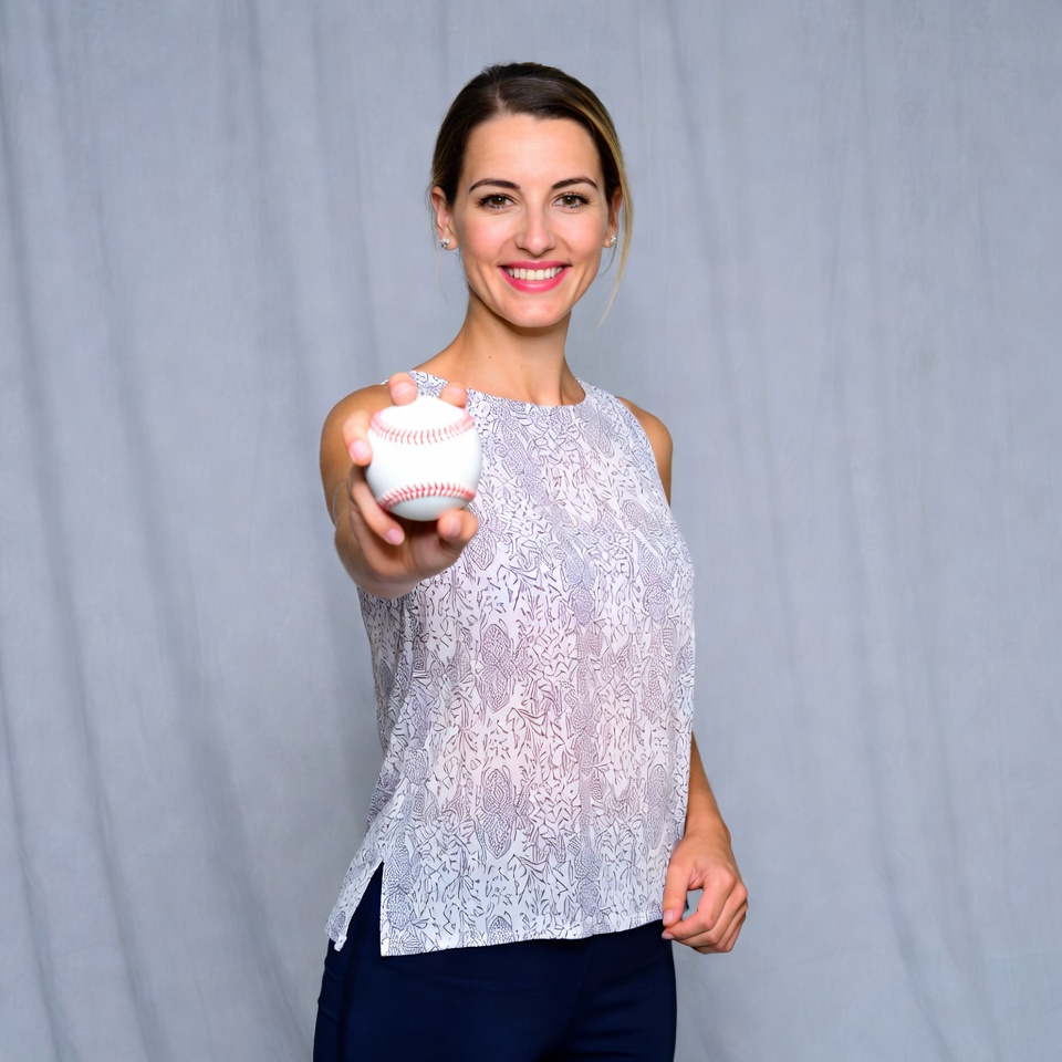 Woman holding baseball Woman holding baseball