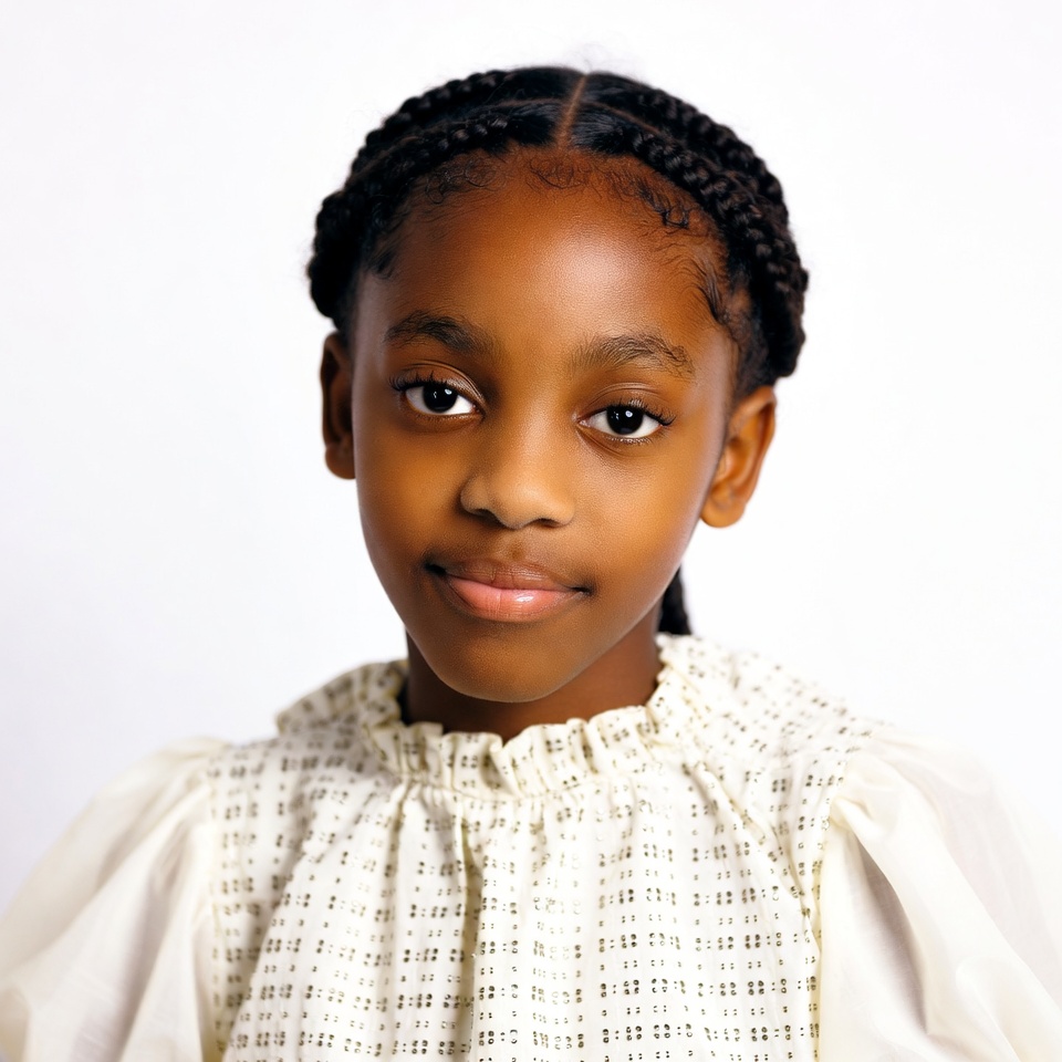 African-American girl with braids smiling African-American girl with braids smiling