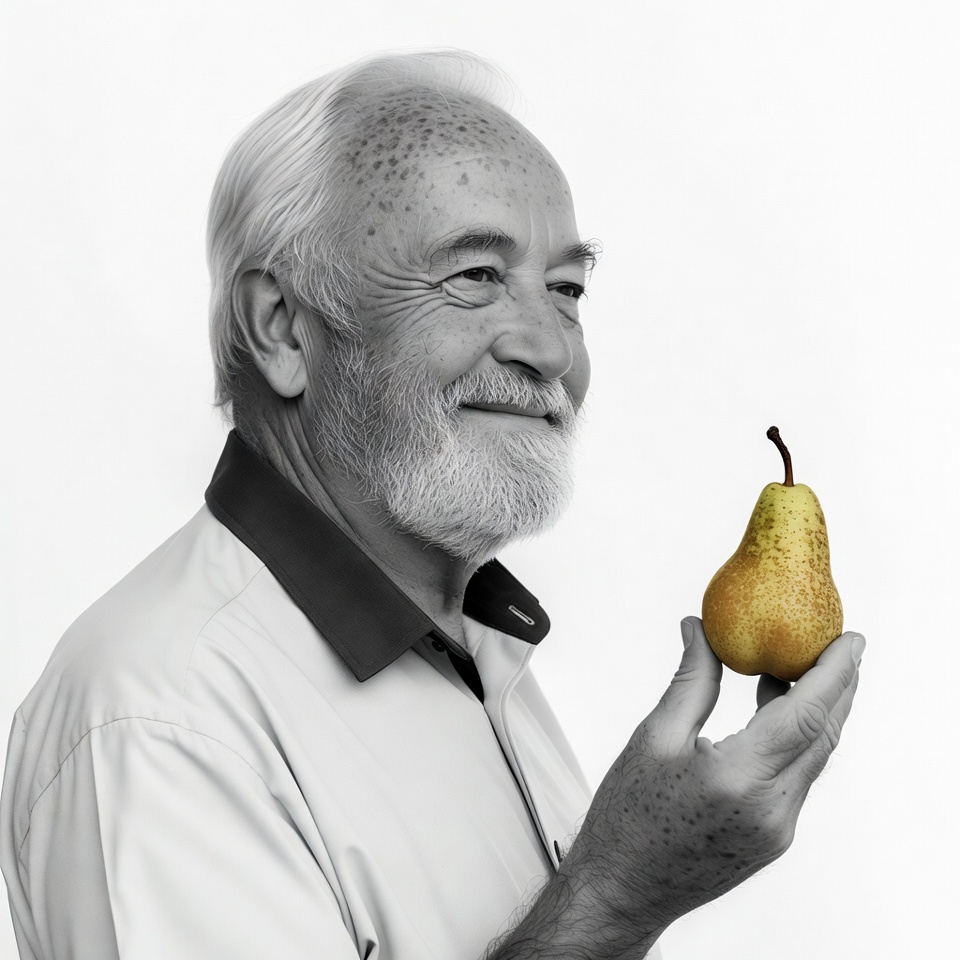 Elderly man holding pear Elderly man holding pear