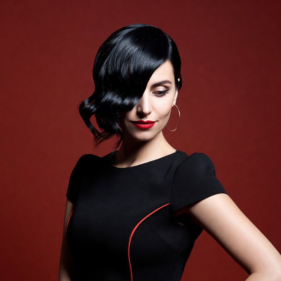 Woman with black wavy bob haircut Woman with black wavy bob haircut