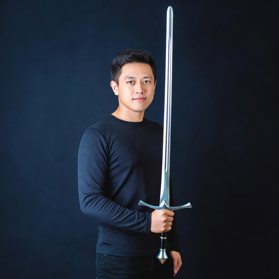 Asian man holding sword Asian man holding sword