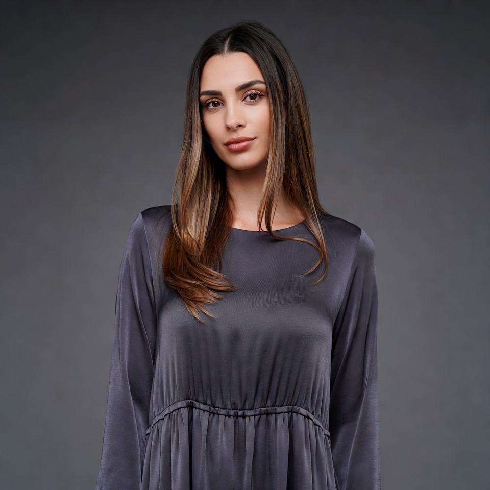 Woman in gray silk dress Woman in gray silk dress