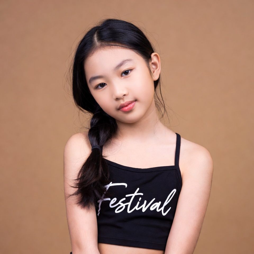 Asian girl in Festival tank top Asian girl in Festival tank top