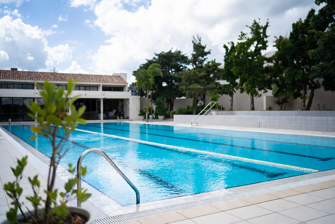 Outdoor Swimming Pool with Clear Blue Water Outdoor Swimming Pool with Clear Blue Water