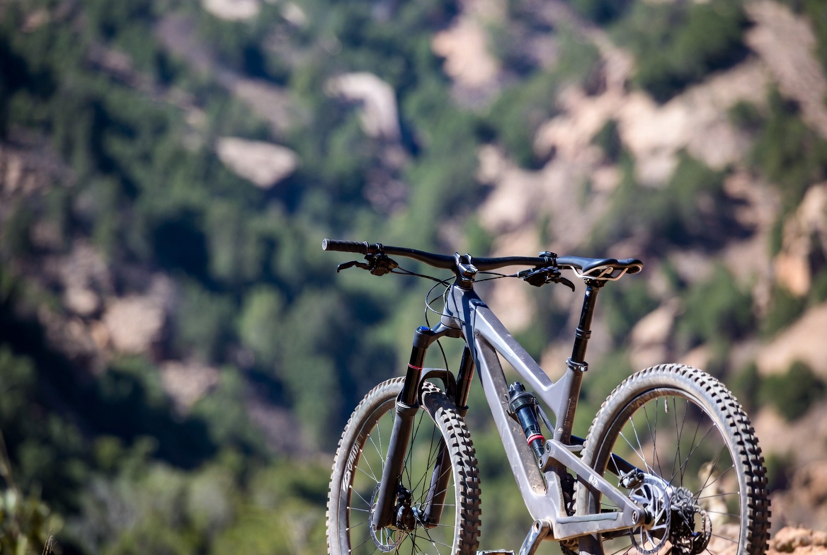 Gray mountain bike on trail overlook Gray mountain bike on trail overlook