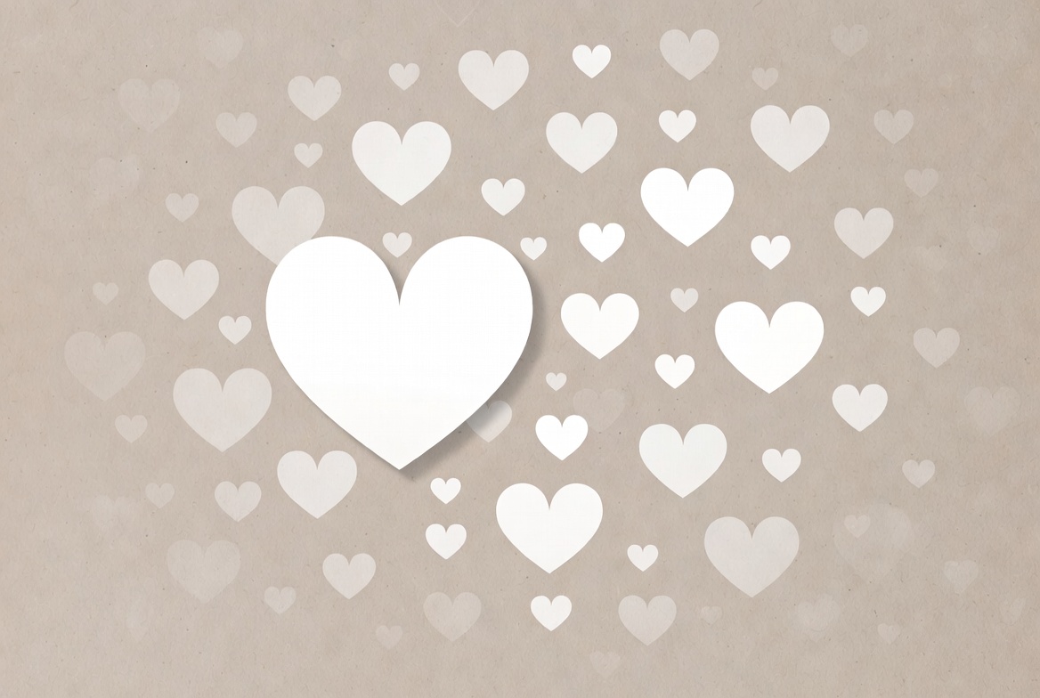White paper hearts on beige background White paper hearts on beige background