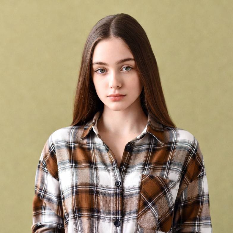 Young woman in plaid shirt Young woman in plaid shirt