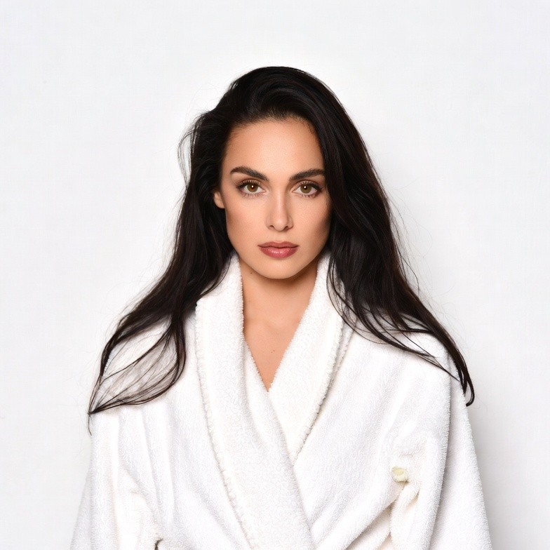 Woman in white bathrobe Woman in white bathrobe