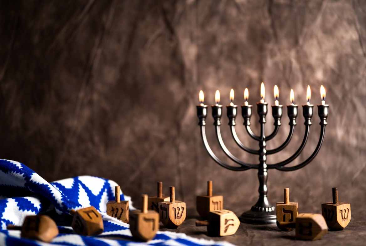 Lit Hanukkah Menorah with Dreidels Lit Hanukkah Menorah with Dreidels