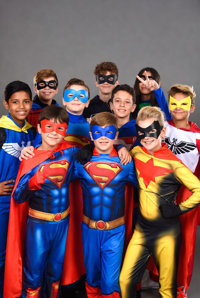 Group of kids in superhero costumes Group of kids in superhero costumes
