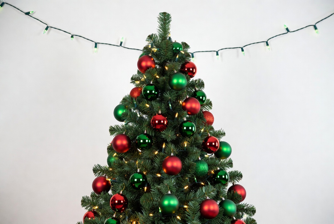 Green Christmas tree with red and green ornaments Green Christmas tree with red and green ornaments