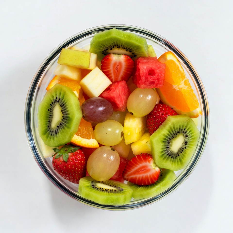 Colorful Fruit Salad in Glass Bowl Colorful Fruit Salad in Glass Bowl