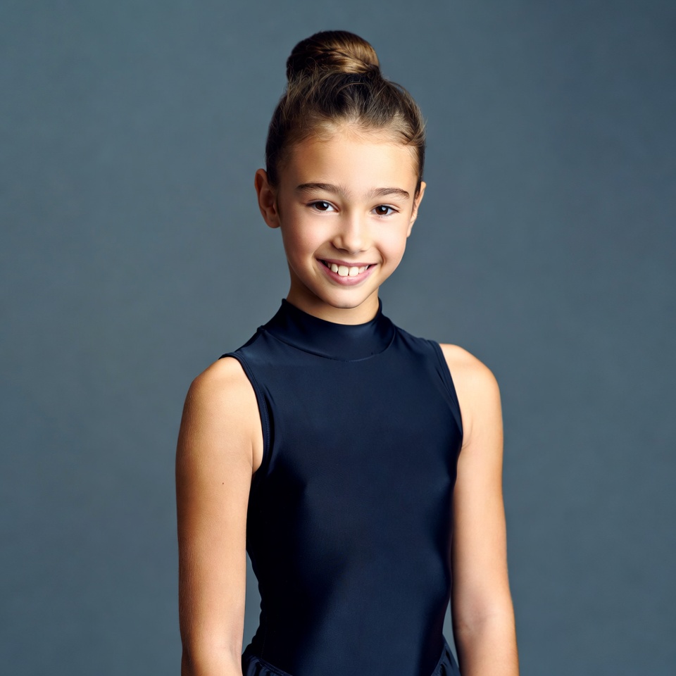 Smiling girl with bun hairstyle Smiling girl with bun hairstyle