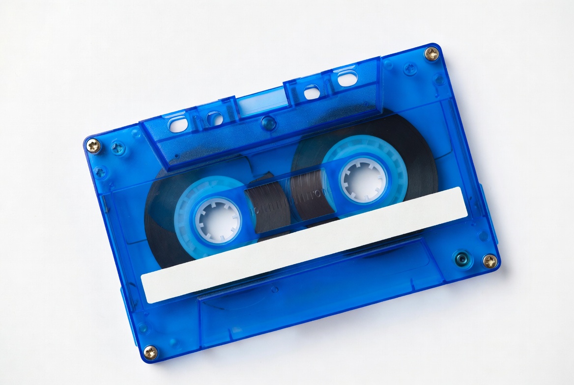 Blue cassette tape on white background Blue cassette tape on white background