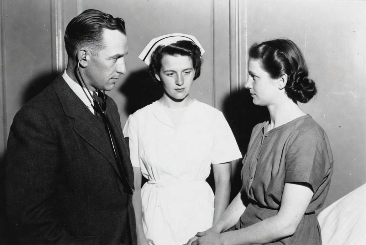Doctor and Two Nurses Talking Doctor and Two Nurses Talking