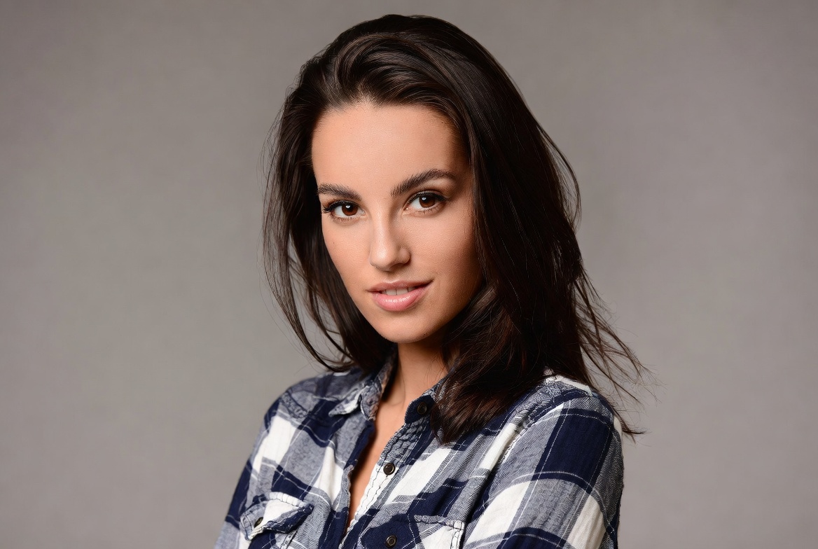 Woman in plaid shirt portrait Woman in plaid shirt portrait