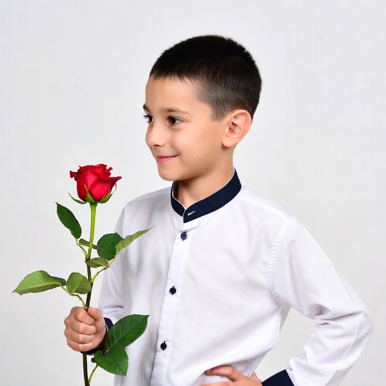 Boy holding red rose Boy holding red rose