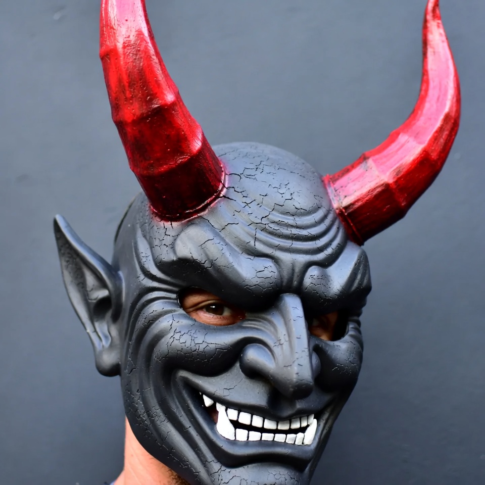 Man wearing demon mask Man wearing demon mask