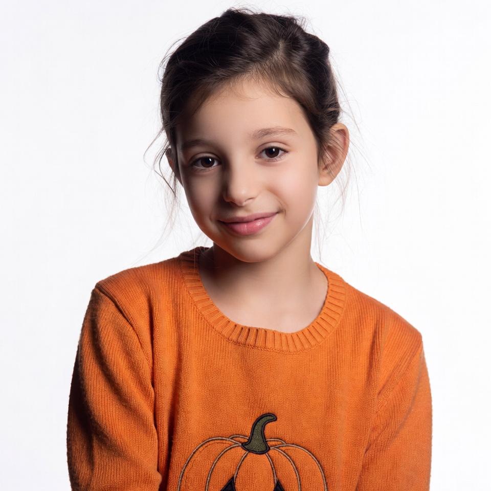 Girl in orange pumpkin sweater Girl in orange pumpkin sweater
