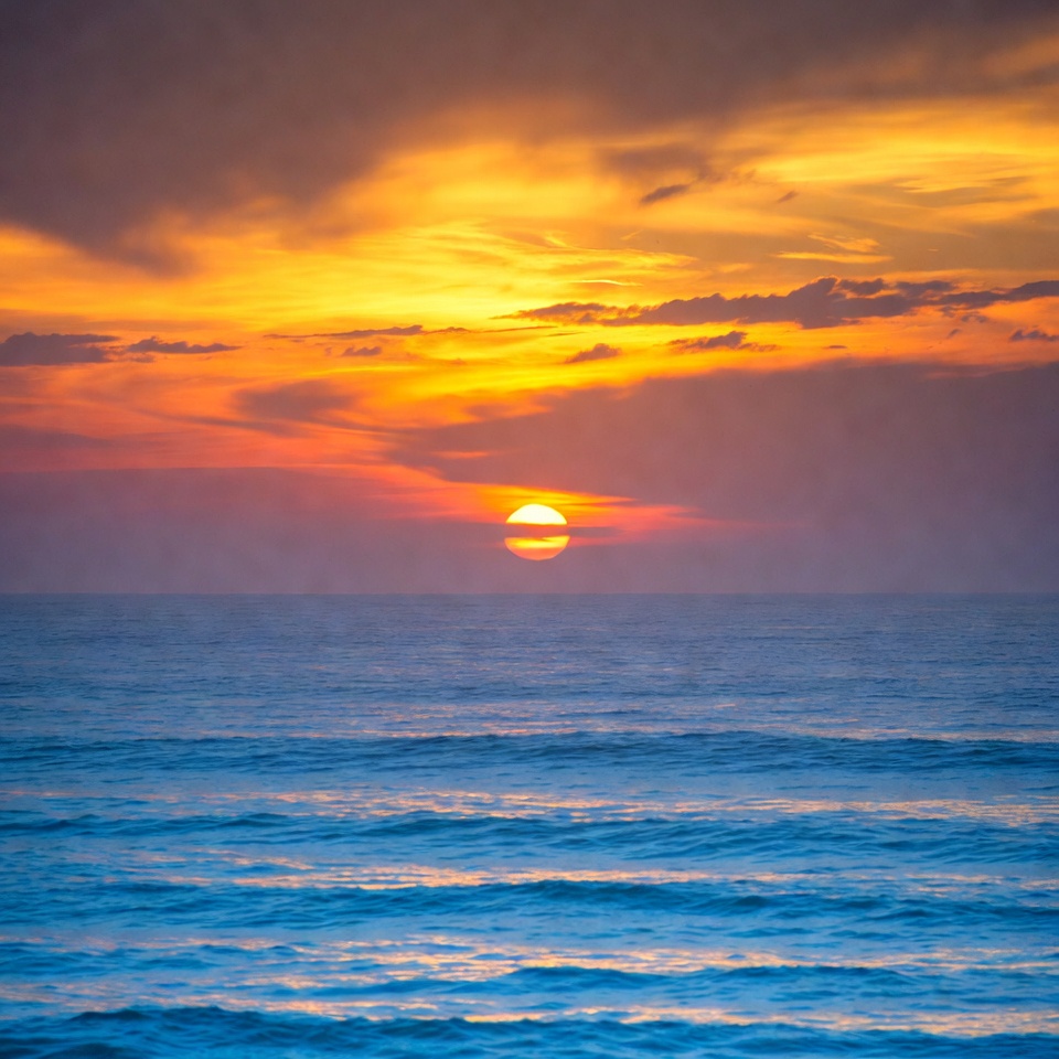 Sunset over ocean waves Sunset over ocean waves