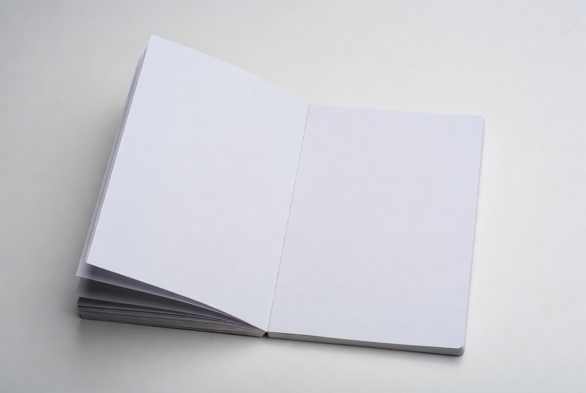 Open Blank Notebook on White Background Open Blank Notebook on White Background