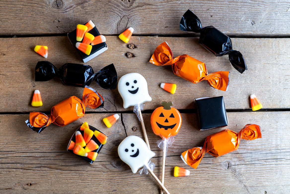 Halloween Candy on Wooden Table Halloween Candy on Wooden Table