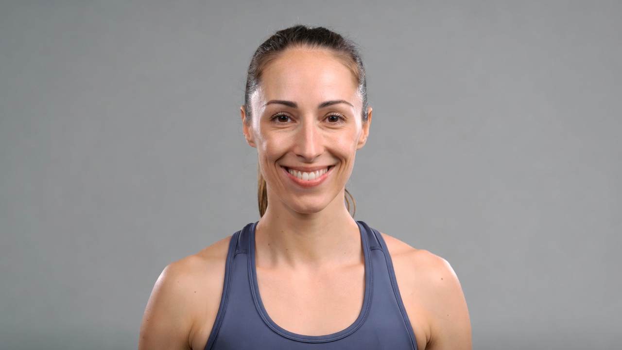 Smiling woman in blue tank top Smiling woman in blue tank top