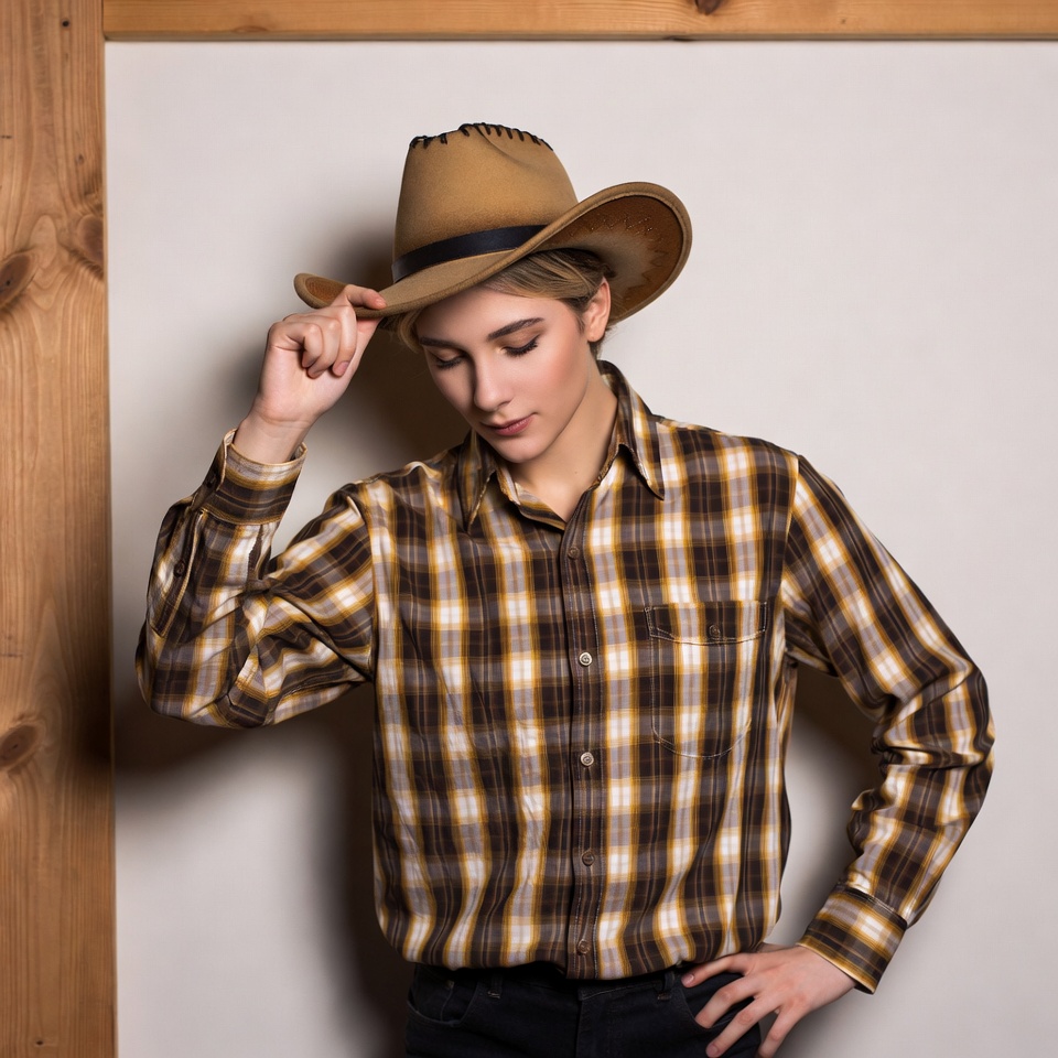 Woman tipping cowboy hat Woman tipping cowboy hat