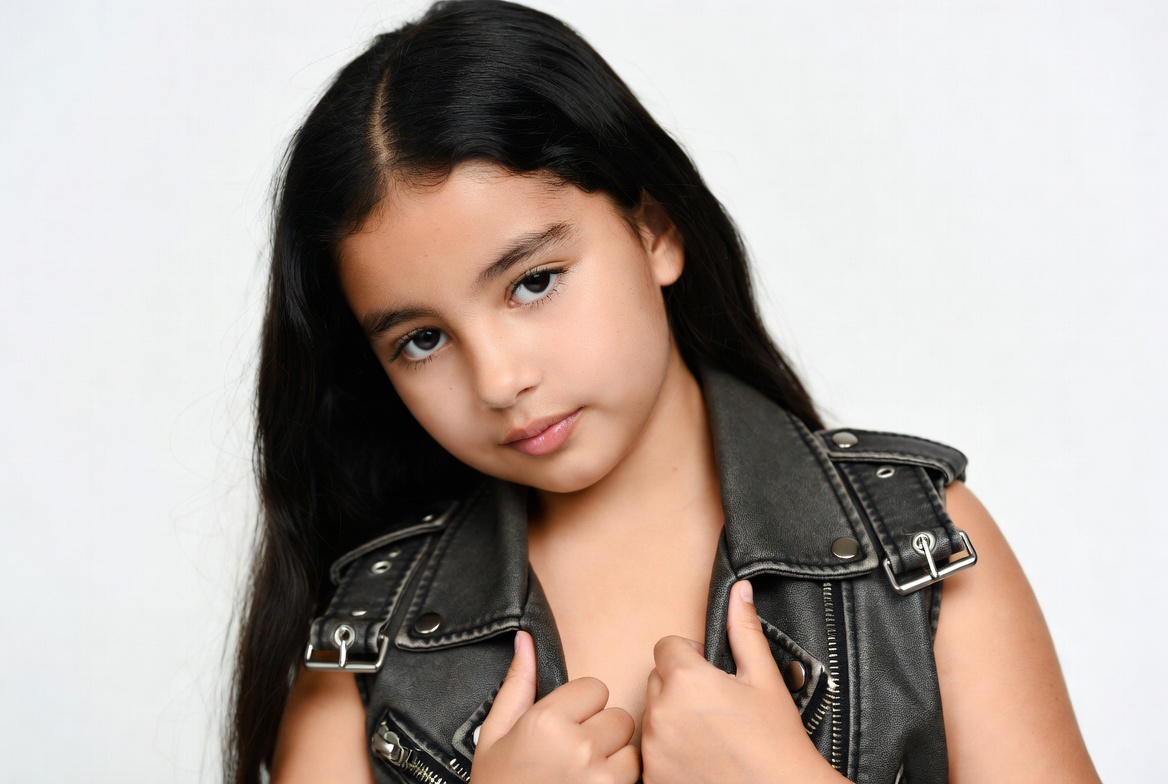 Young girl in leather vest Young girl in leather vest