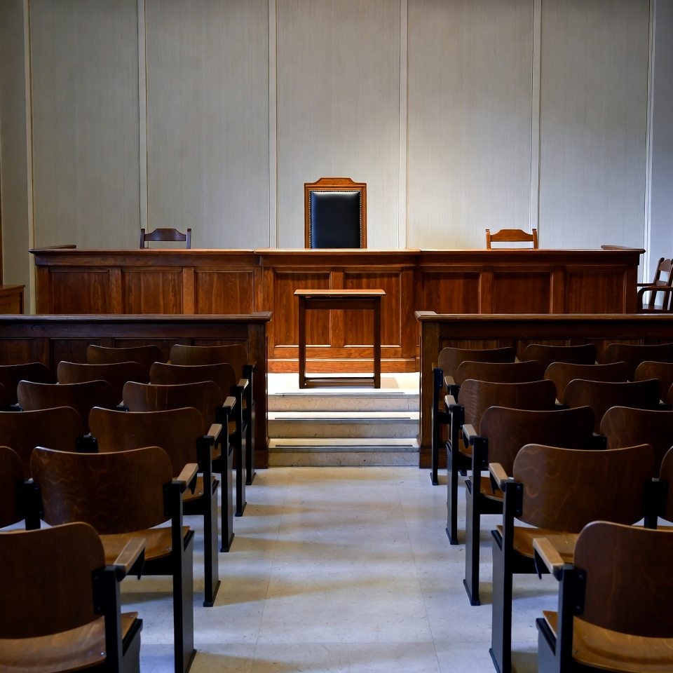 Empty Wooden Courtroom with Judge's Bench Empty Wooden Courtroom with Judge's Bench