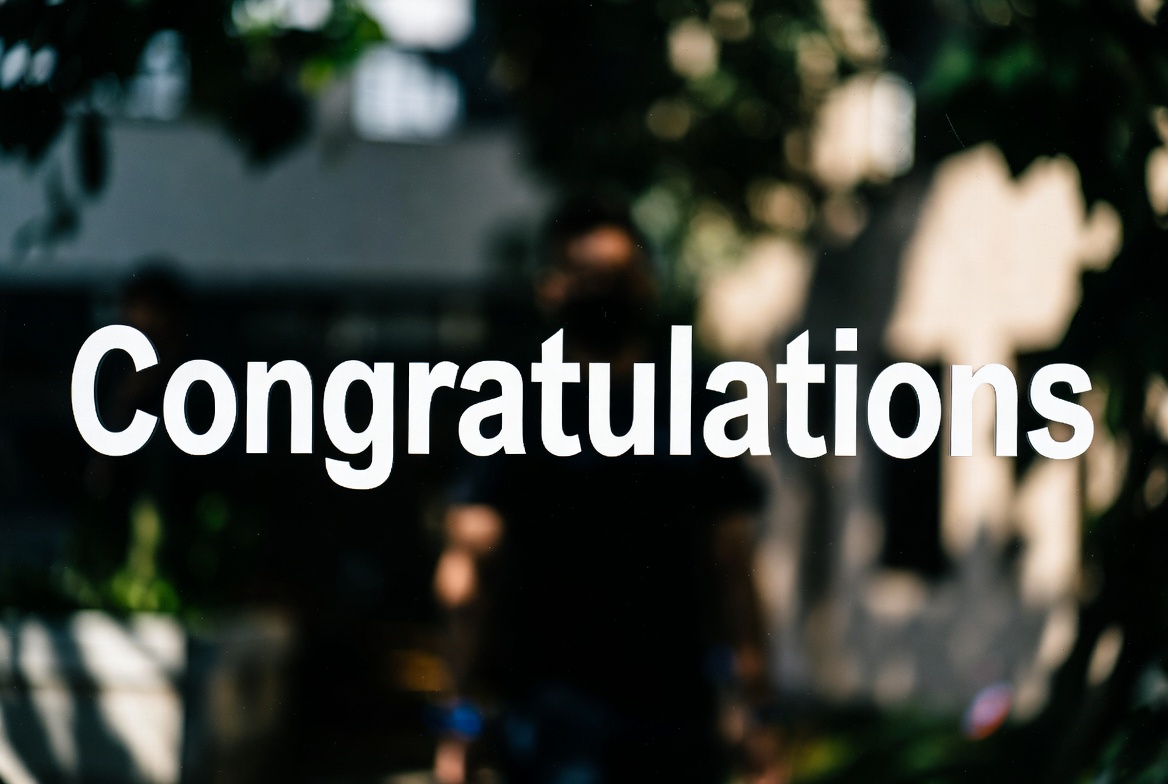 Congratulations Text on Glass Window Congratulations Text on Glass Window