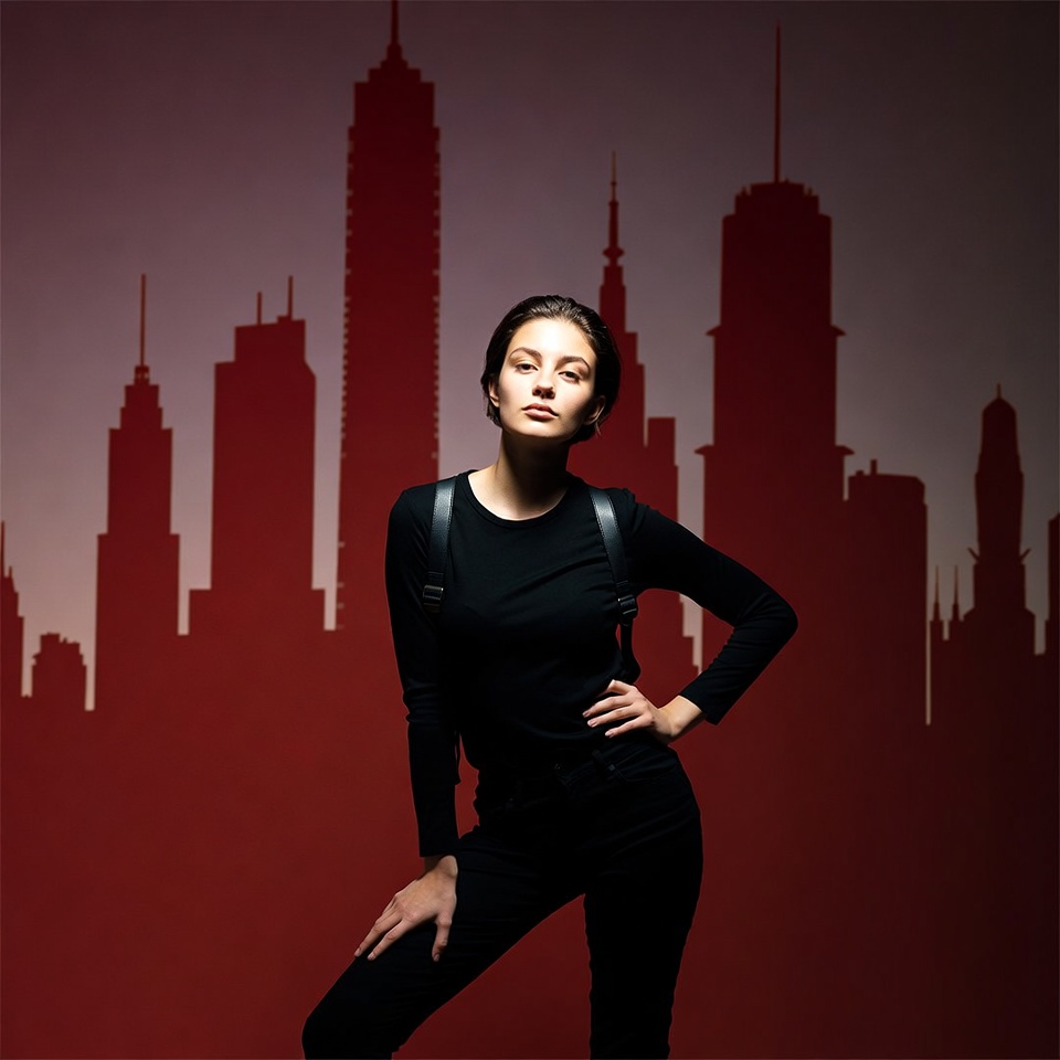 Woman posing in front of city skyline Woman posing in front of city skyline