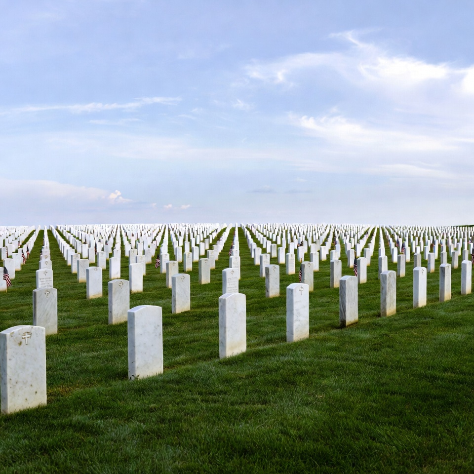 Vast cemetery with white headstones Vast cemetery with white headstones