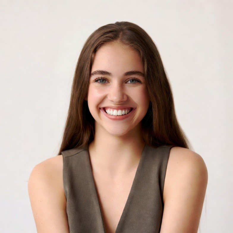 Smiling young woman with brown hair Smiling young woman with brown hair