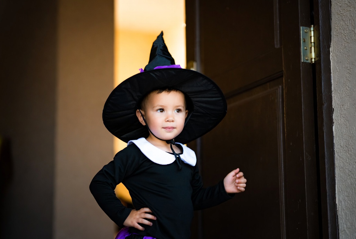 Toddler girl in witch costume Toddler girl in witch costume
