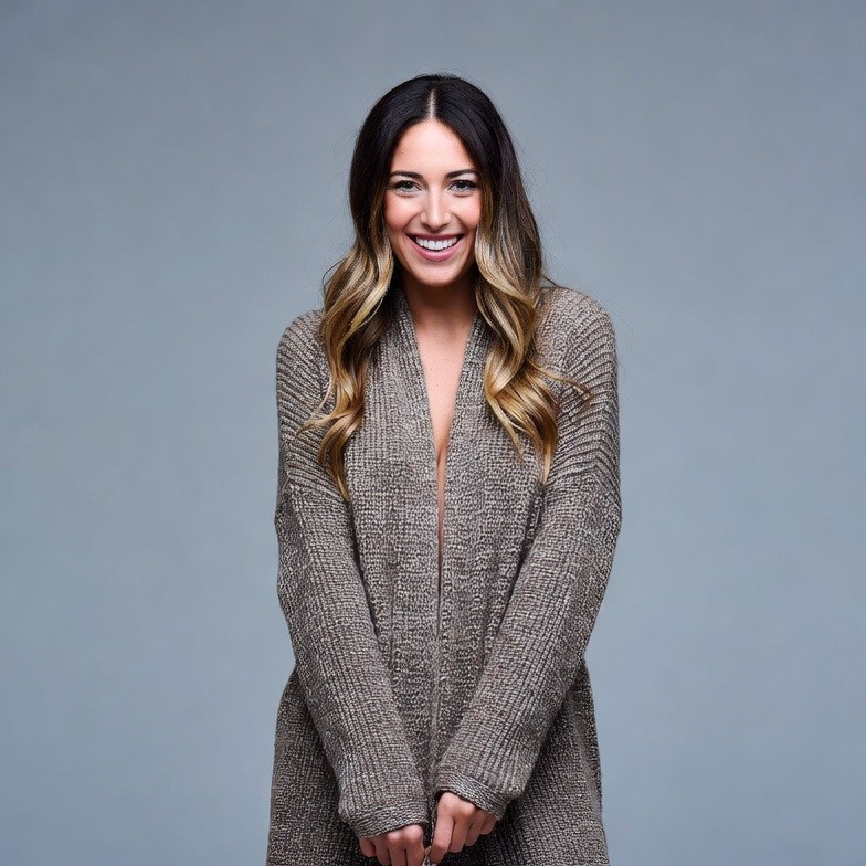 Smiling woman in open knit cardigan Smiling woman in open knit cardigan