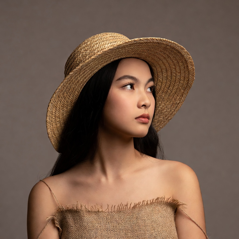 Asian woman wearing straw hat Asian woman wearing straw hat
