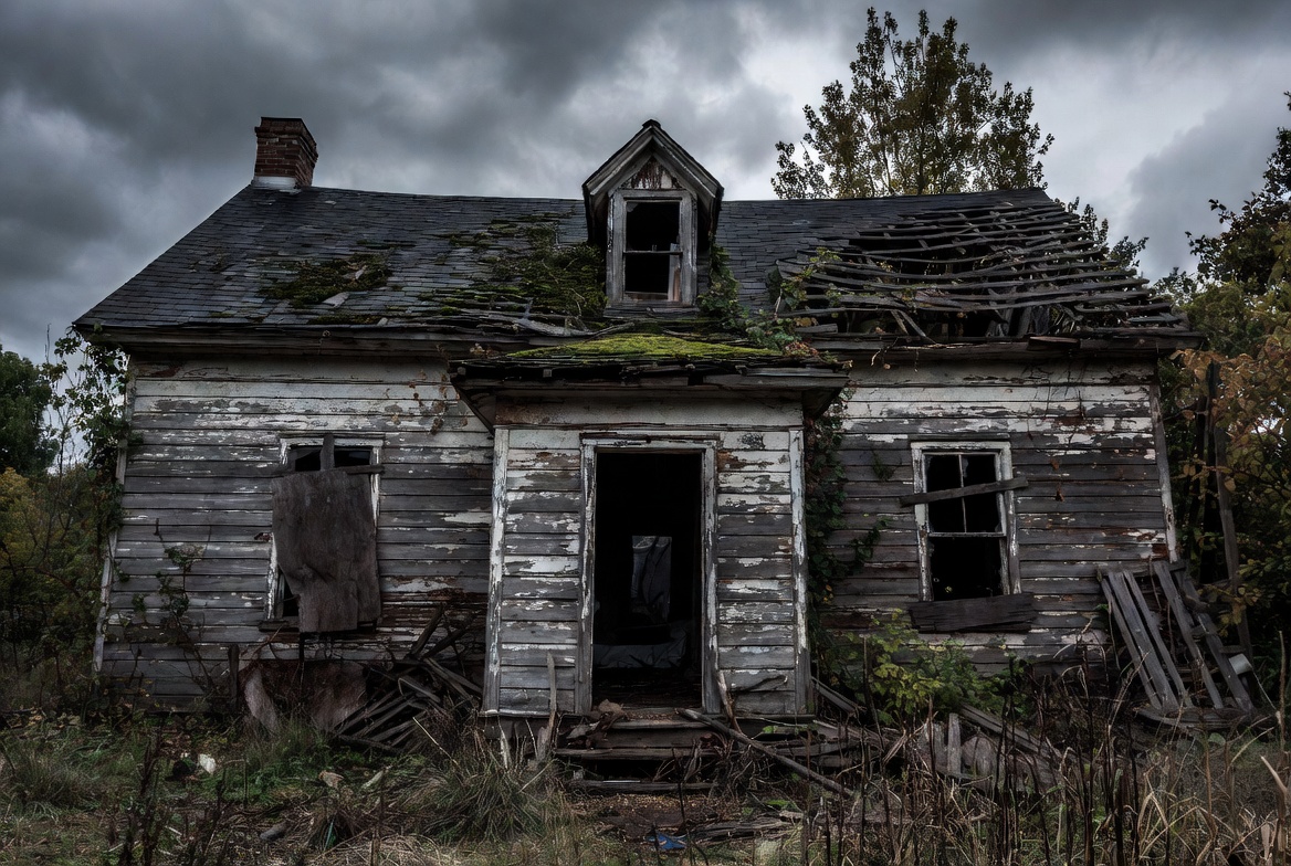 Abandoned haunted house in stormy woods Abandoned haunted house in stormy woods