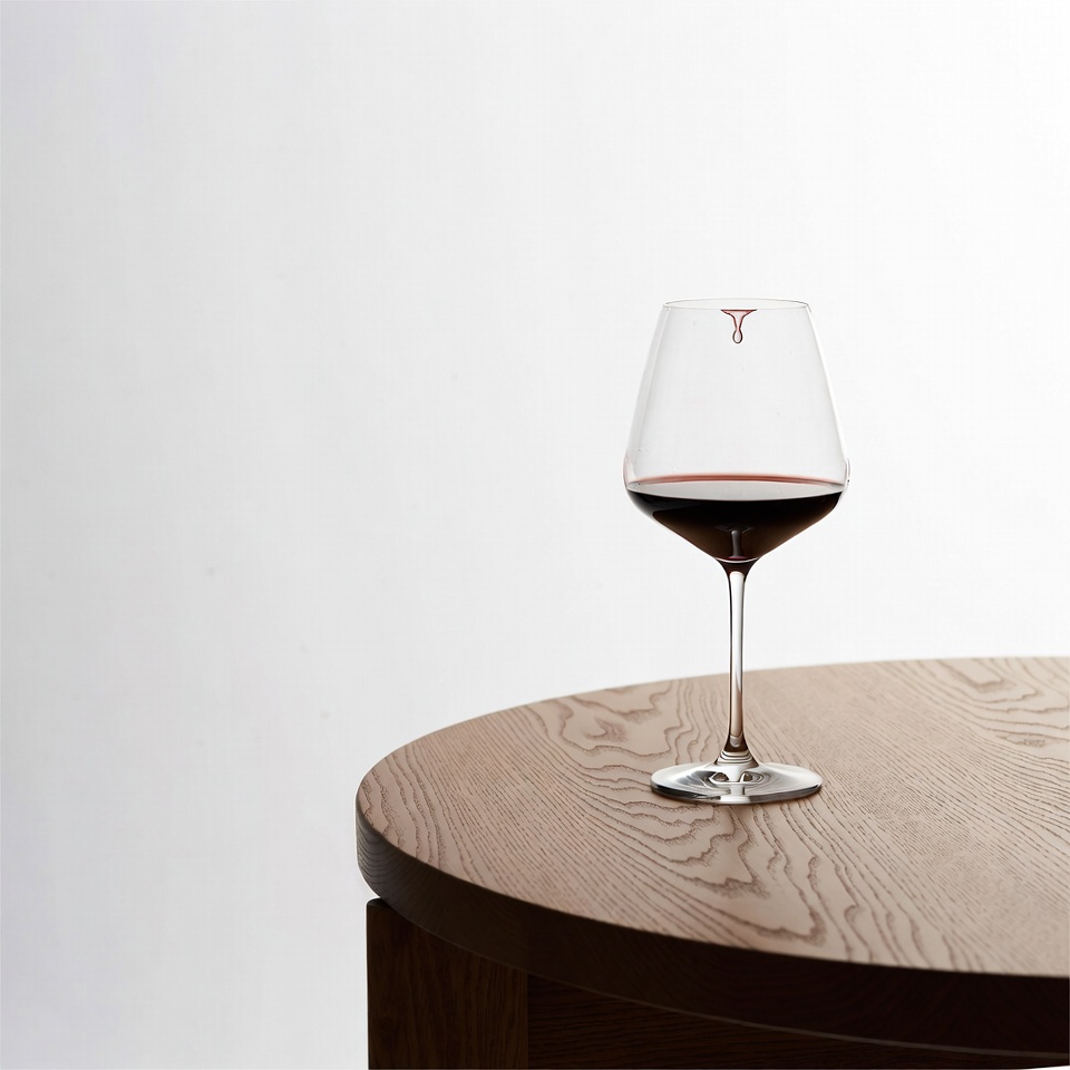 Red Wine Glass on Wooden Table Red Wine Glass on Wooden Table
