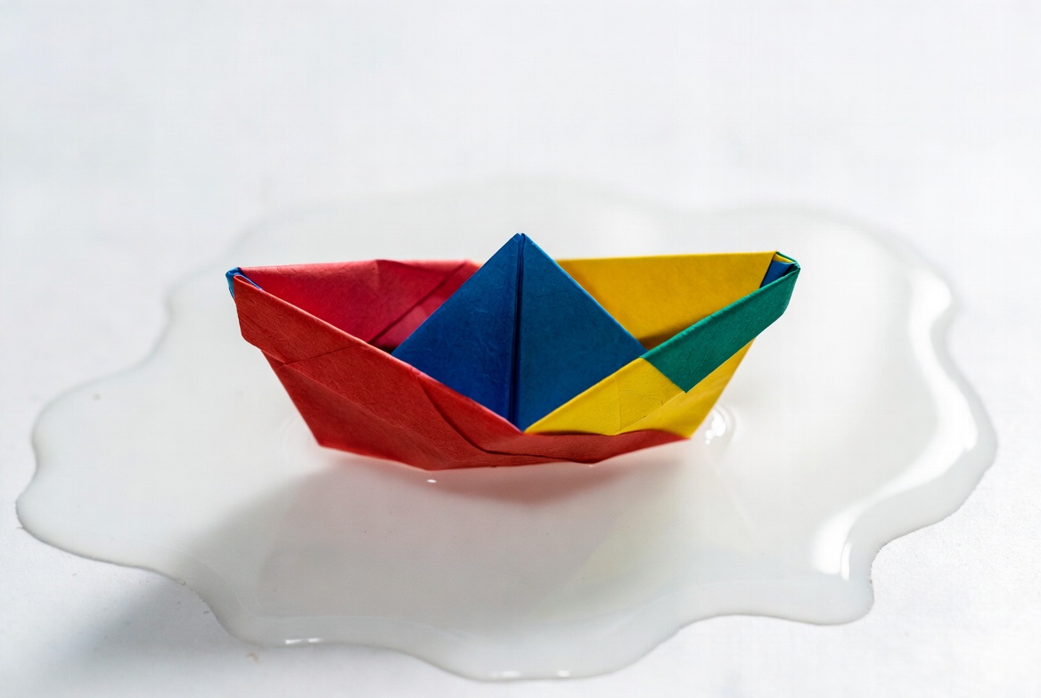 Colorful Origami Boat on Plate Colorful Origami Boat on Plate