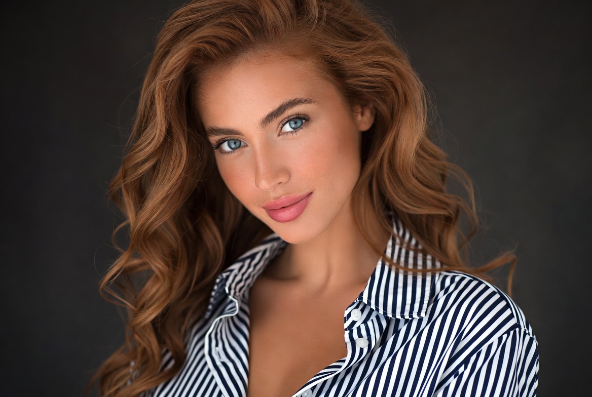 Beautiful woman with red wavy hair Beautiful woman with red wavy hair