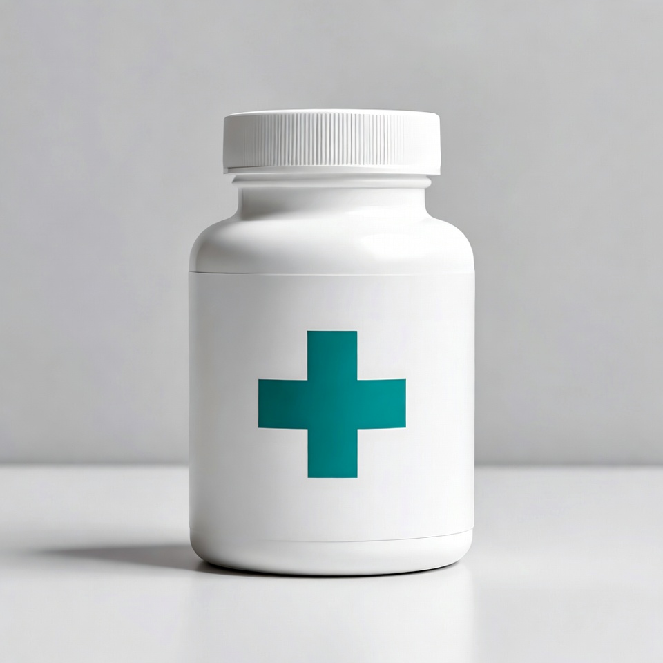 White medicine bottle with teal cross White medicine bottle with teal cross